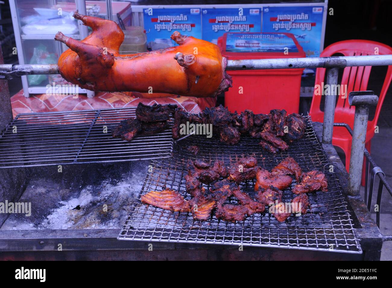 animal-cruelty-barbecued-dog-on-a-spit-at-a-local-restaurant-steung-meanchey-phnom-penh-cambod...jpg