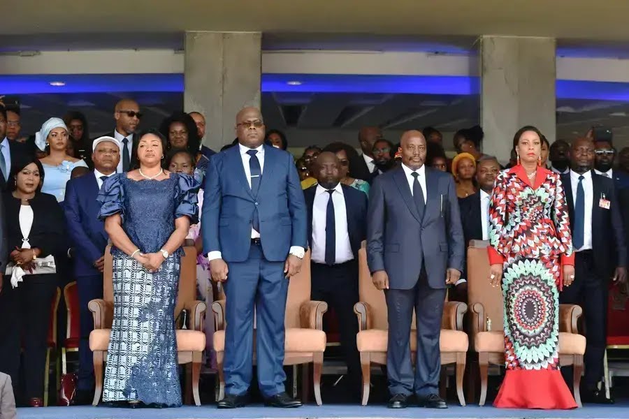 Democratic Republic of Congo's outgoing President Joseph Kabila and his successor Felix Tshisekedi stand during an inauguration ceremony where Tshisekedi will be sworn into office at the Palais de la Nation in Kinshasa, DRC on January 24, 2019.