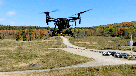 Aerial view of a drone flying over the team's basecamp.